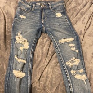 Distressed American Eagle jeans rips in the back
